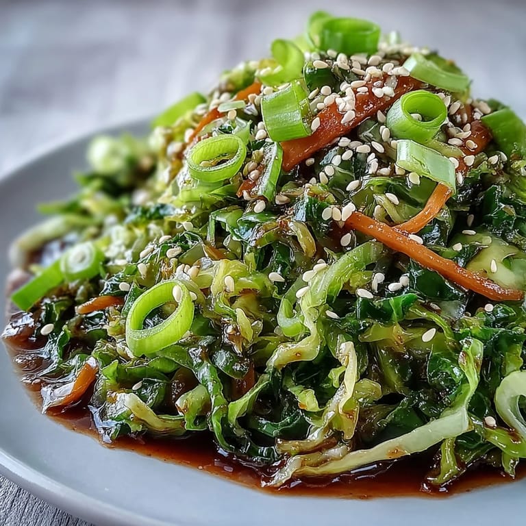 Hot and Sour Cabbage served hot alongside fluffy white rice, showing a colorful vegan and gluten-free side dish.